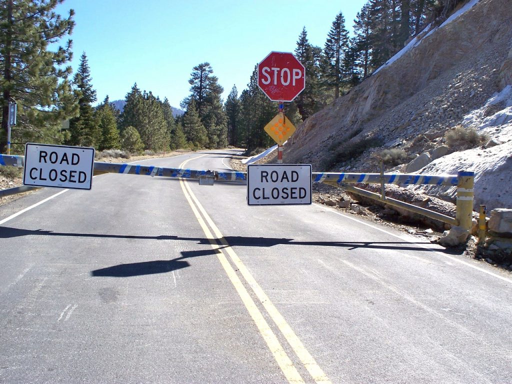 An archived road-closure scene at Islip Saddle, Angeles National Forest. This is not a current closure report.